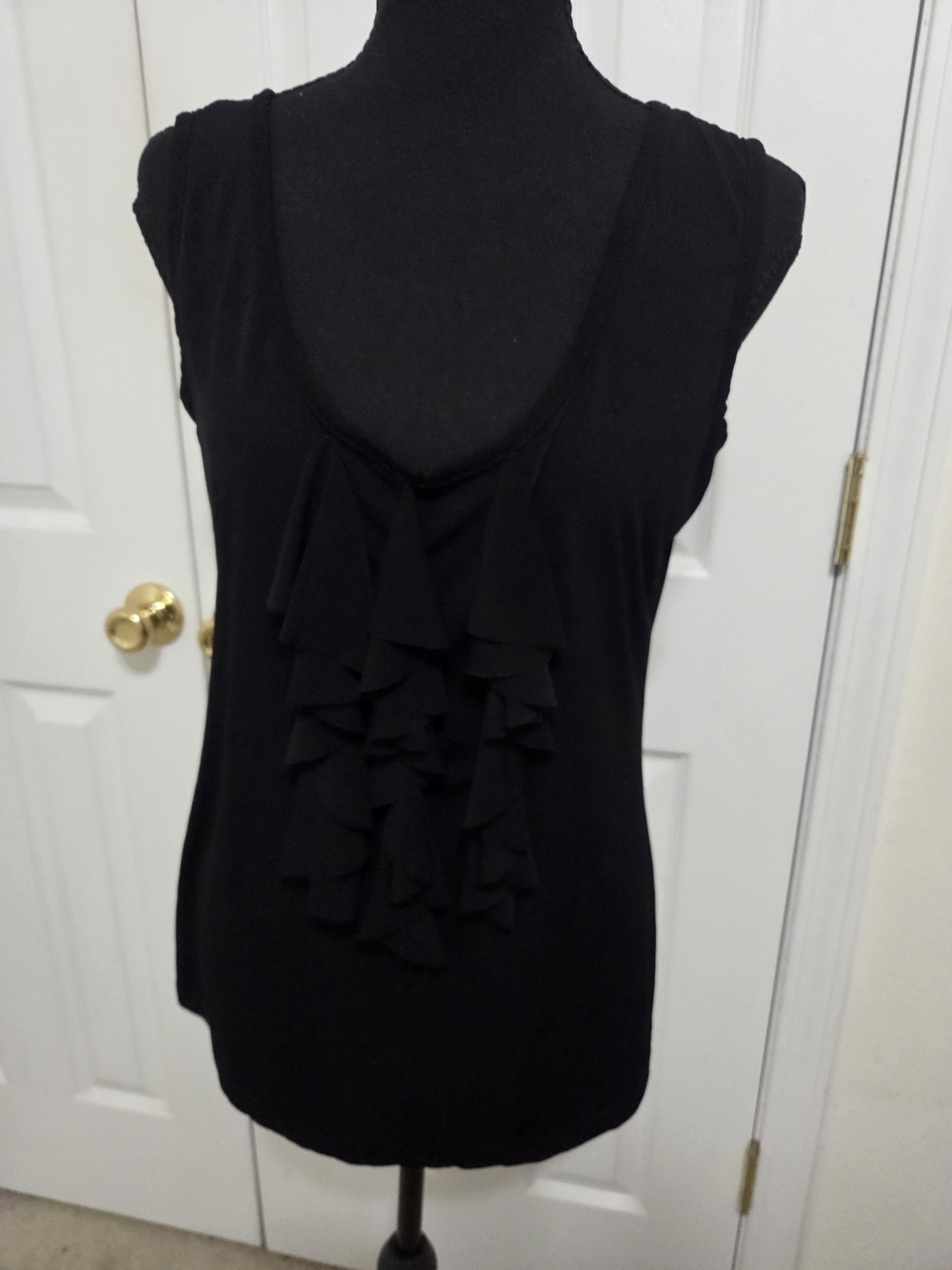 Dots Black Ruffle Front Sleeveless Top